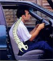 man slumping while driving with xray type image of spine in unhealthy curve